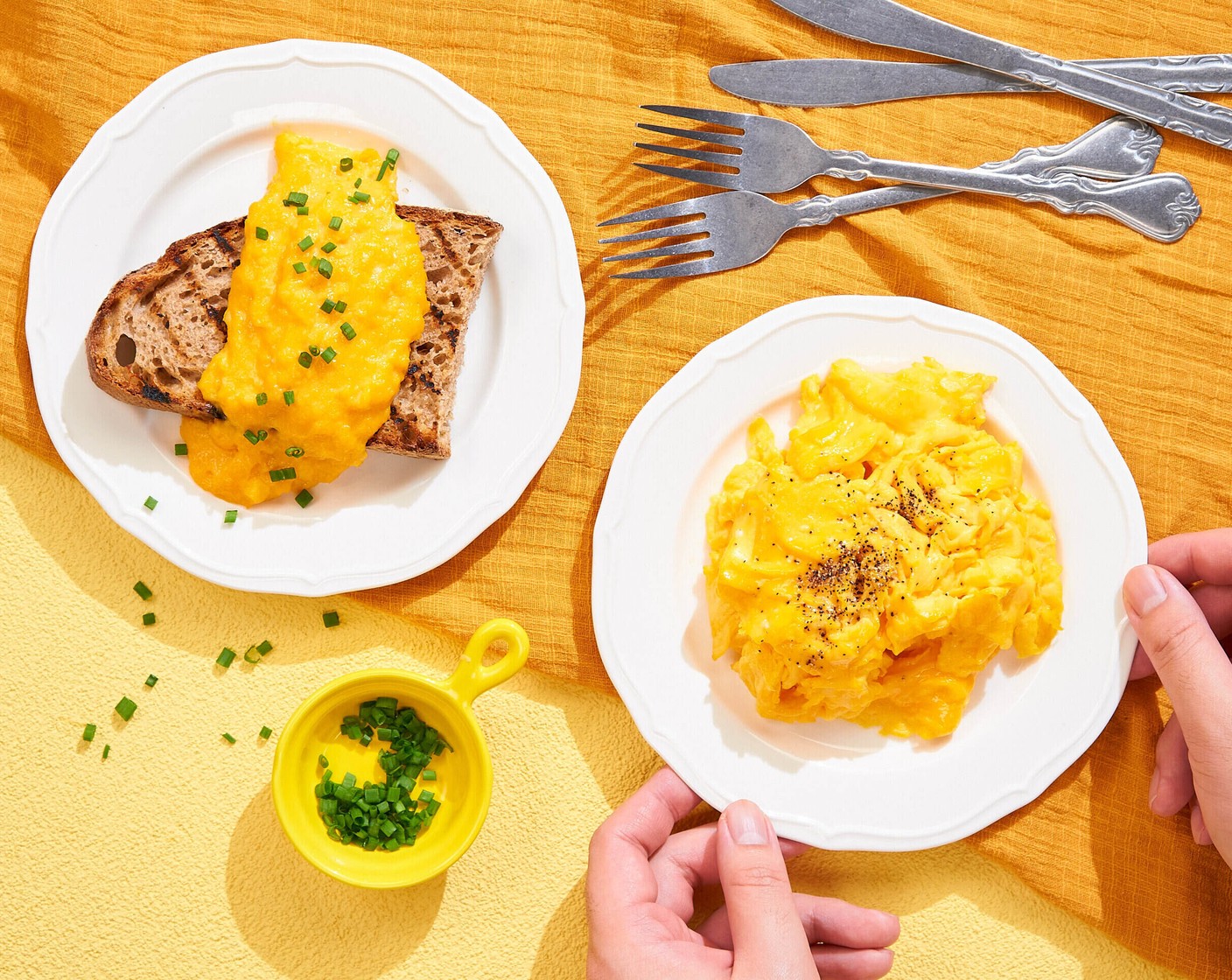 Premium Photo  Scrambled, frying eggs from one egg in a small pan on  yellow background