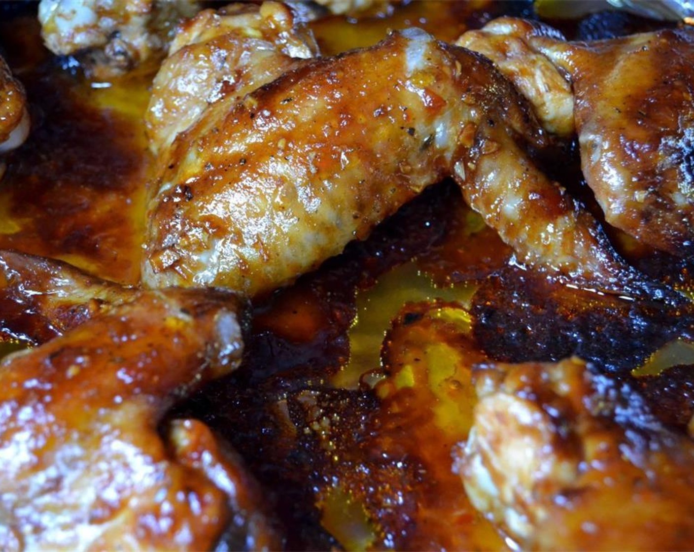 step 4 Arrange the wings on a lined baking sheet (you may need two of them) and bake directly under the grill for 25 to 30 minutes, turning once or twice and basting liberally with any leftover marinade.