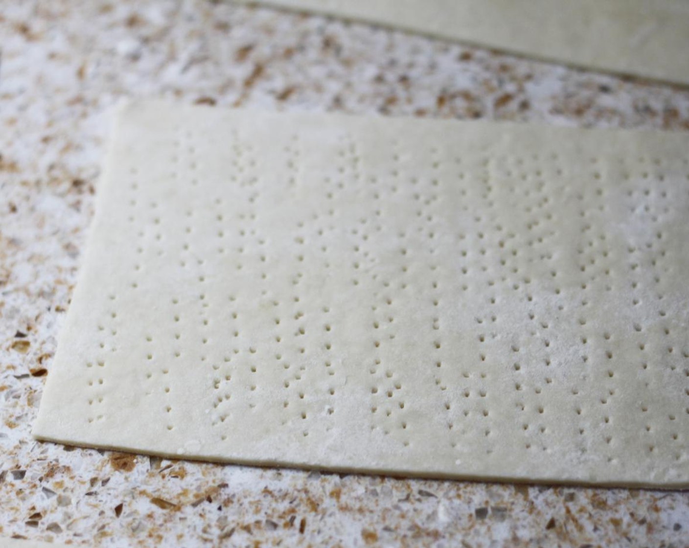 step 8 Prick each piece of dough with a fork, around 25 times.