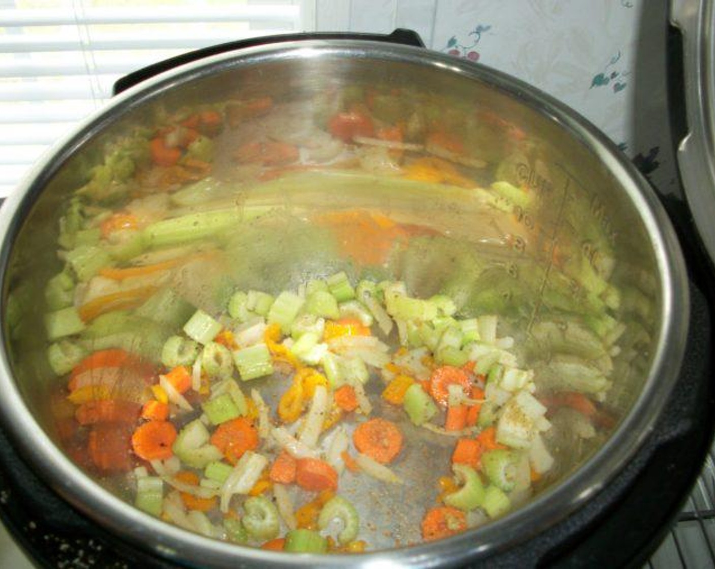 step 2 Sauté Onion (1/2 cup), Celery (1/2 cup), Carrot (1/2 cup), and Bell Pepper (1/4 cup) for two minutes. Stir frequently. Add Salt (1 tsp) and Ground Black Pepper (1/2 tsp). Turn off heat.