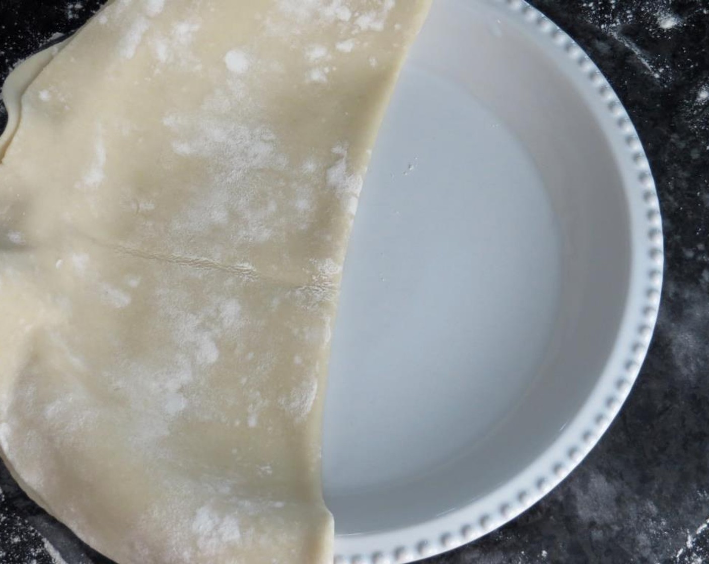 step 4 Transfer crust to pie plate. Trim off any excess crust that hangs beyond 1/4" over the edges.