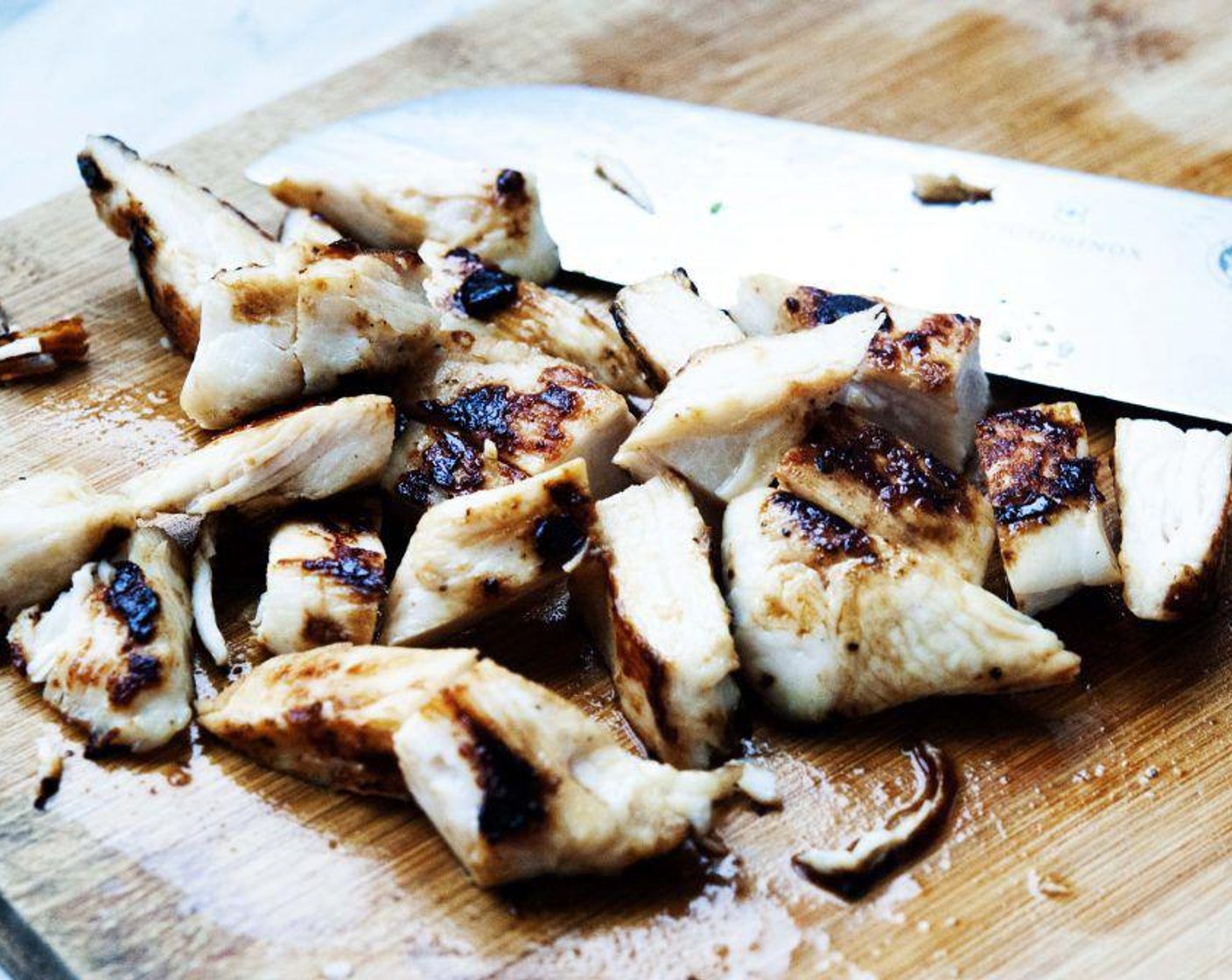 step 5 Skin and slice up the Chicken Breasts (9 oz), season with Salt (to taste) and Ground Black Pepper (to taste), and cook it on a hot grill. Then cut it up into cubes.