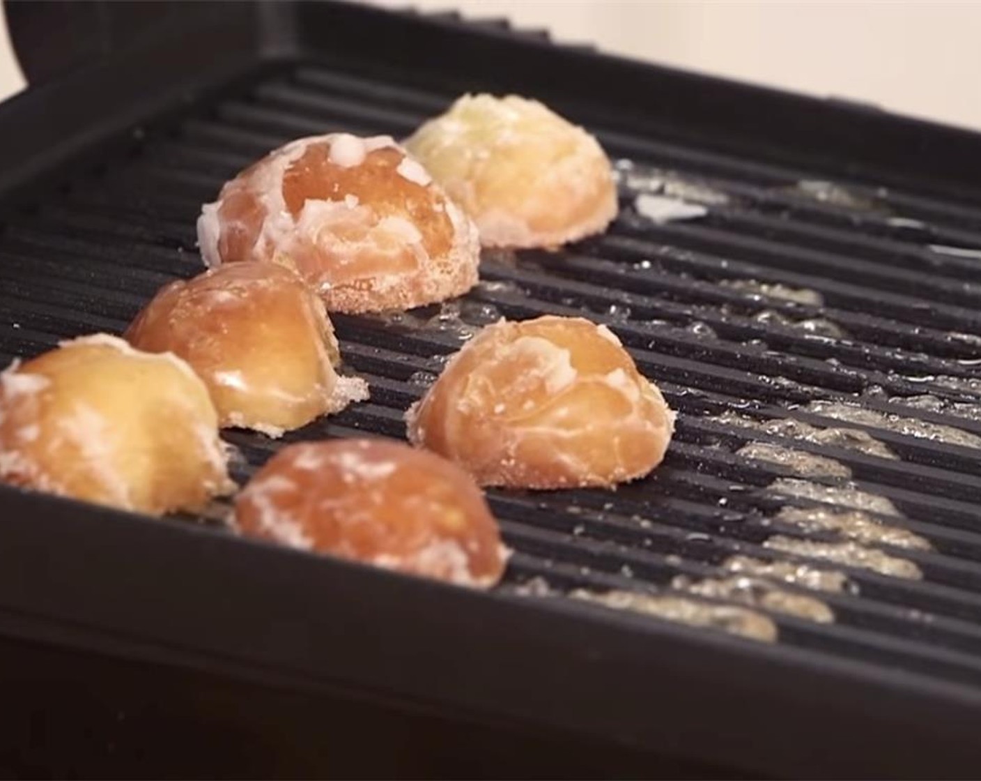 step 6 Place donut holes cut side down and press for about 30 seconds.