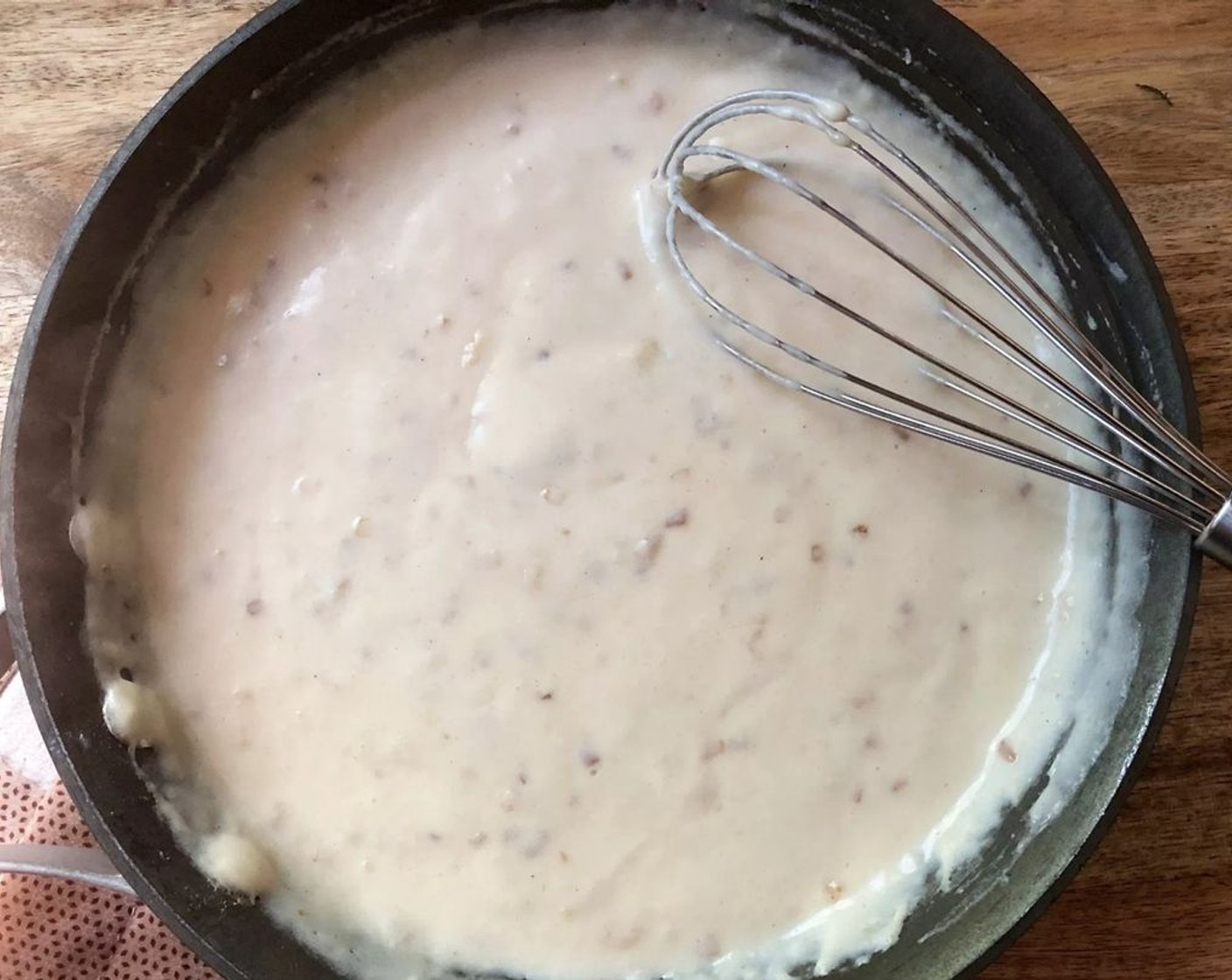 step 6 Add the Whole Milk (480 mL), whisking to combine well. Bring to a boil. Reduce heat and simmer for 2 minutes, stirring often.