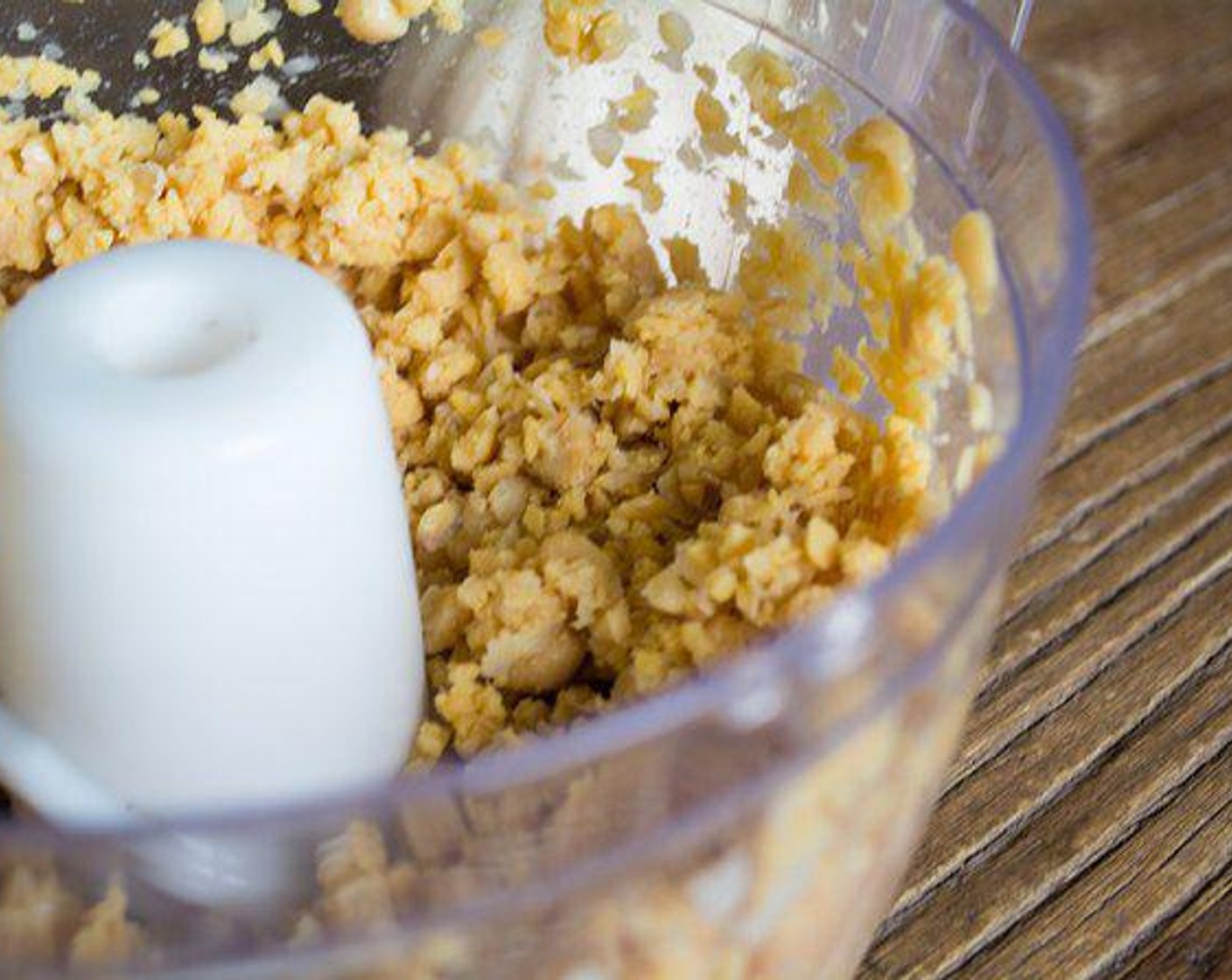 step 1 Rinsed and drain GOYA® Chick Peas (2 cups) then add them to bowl of food processor. Pulse 2-3 times to until chickpeas are well ground, but not quite pureed.