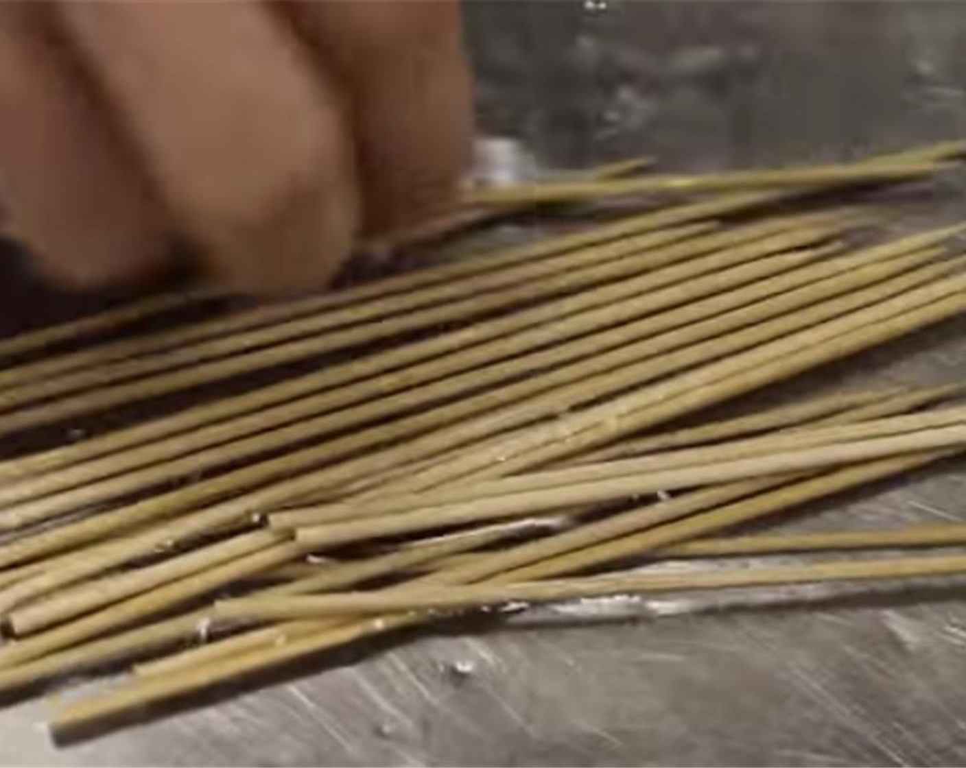 step 7 Soak the bamboo skewers in water for at least an hour to prevent them from burning while baking or frying.