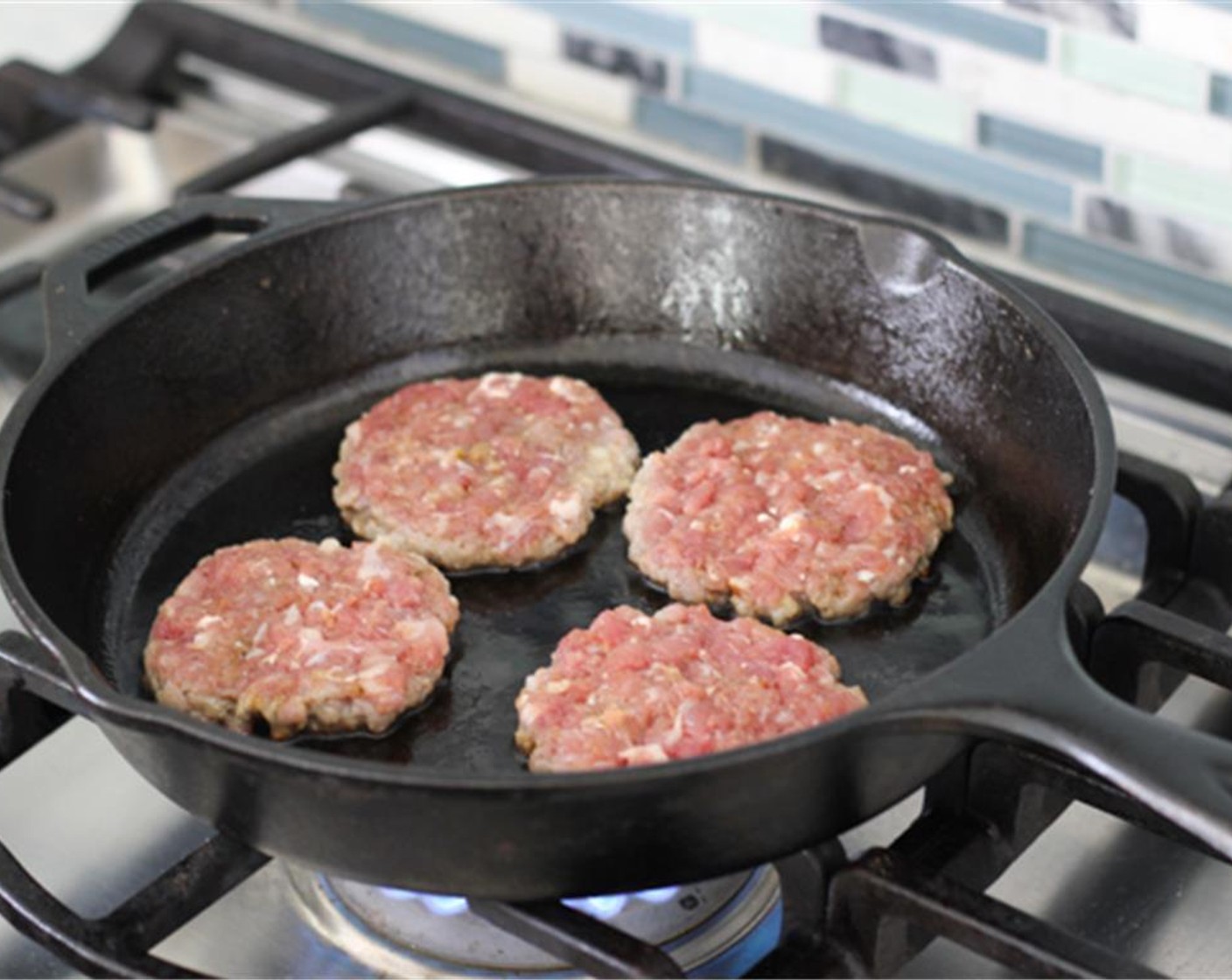 step 3 When cooking the sausage, heat up some Frying Oil (as needed) in a skillet, add the sausages and brown them on both sides on medium heat, about 5 minutes per side.