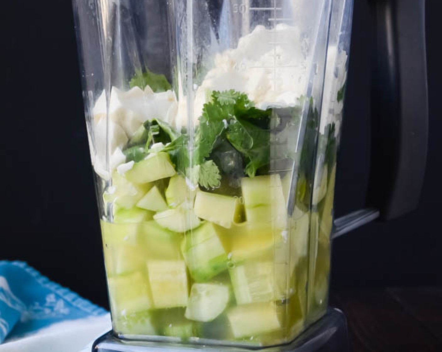 step 1 In a blender, combine the English Cucumbers (2), Fresh Cilantro (1/2 cup), Silken Tofu (8 oz), Vegetable Broth (6 fl oz), Garlic (1 clove), White Wine Vinegar (2 tsp), and Kosher Salt (1 tsp) for the soup. Puree until smooth. Refrigerate at least two hours to chill before serving. Season to taste.