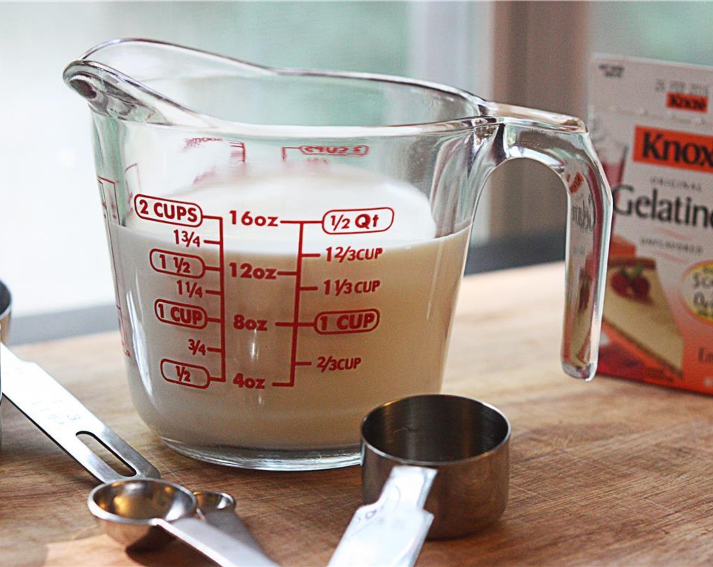 step 9 Once the cake has cooled to room temperature, pour Gelatin Powder (1/2 Tbsp) and Water (2 Tbsp) into a stainless steel bowl.  Allow to sit for 10 minutes.