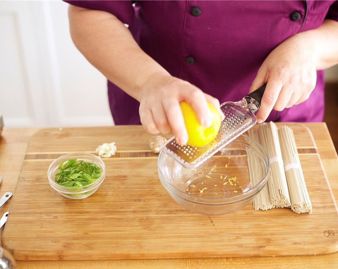 step 4 Zest and juice the Lemon (1) into medium bowl and discard any seeds. Mince the Garlic (1 clove) and add to the bowl. Peel the Fresh Ginger (2 Tbsp) and grate using zester or mince by knife, and add to bowl.