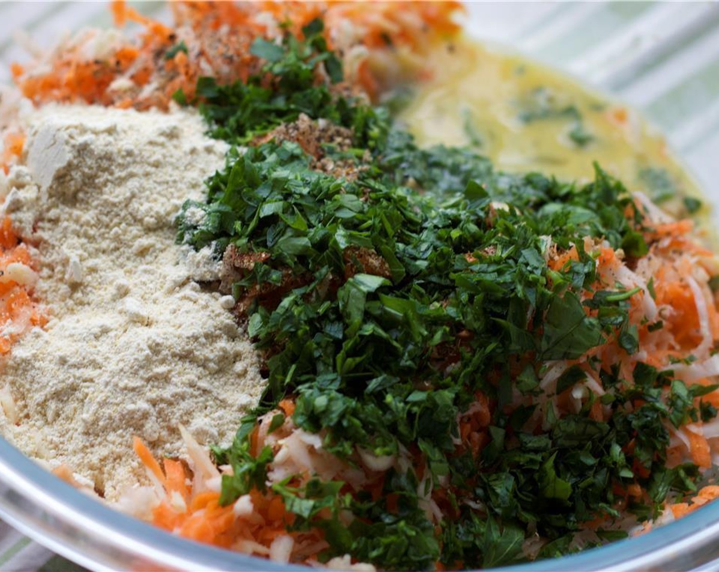 step 4 Combine the eggs, carrots, Chickpea Flour (1/4 cup), coriander seeds, Salt (1/4 tsp) and Ground Black Pepper (1/4 tsp) to form a uniform mixture.