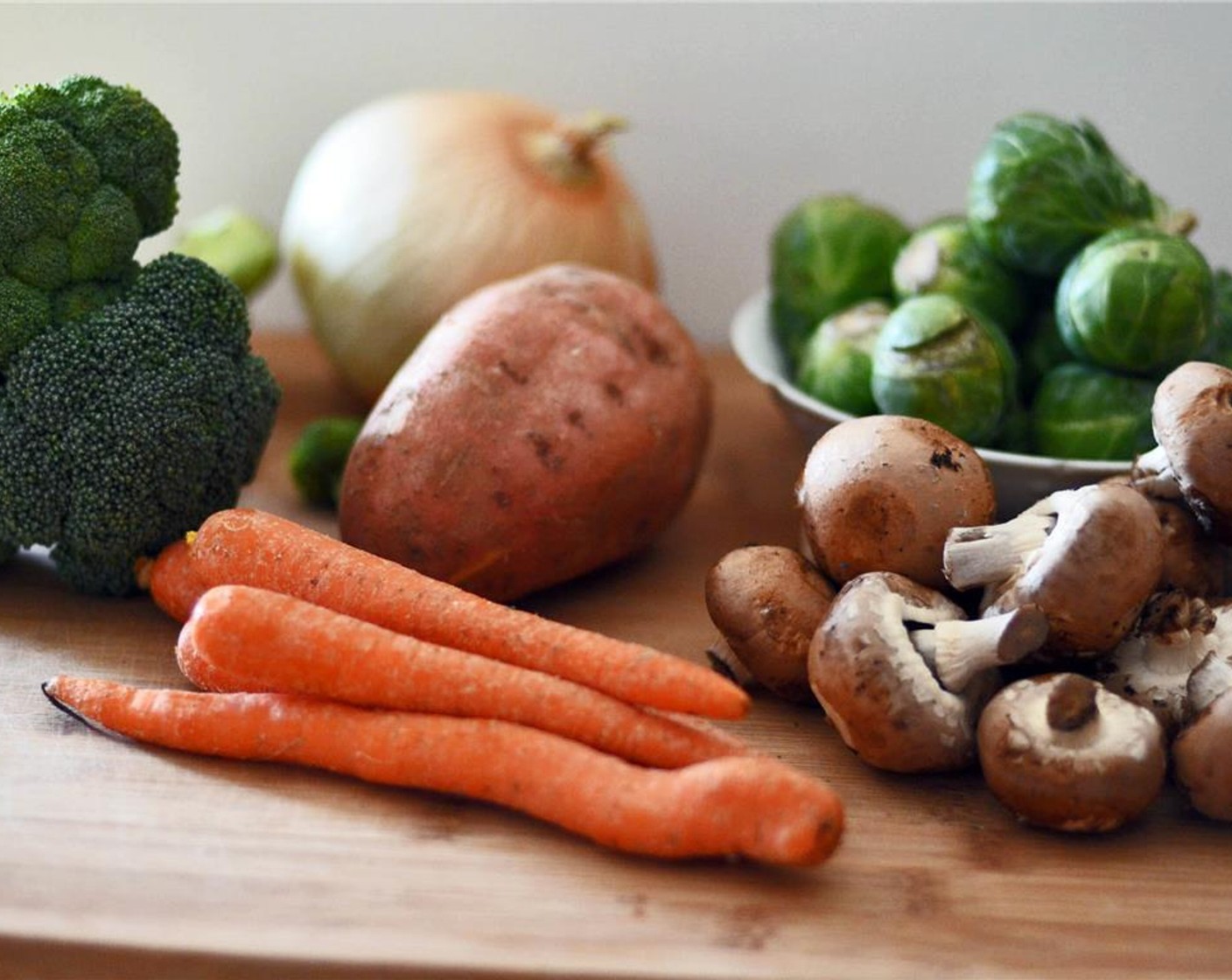 step 3 Halve the Mushrooms (2 1/4 cups) and Brussels Sprouts (10). Chop the Carrots (4) into large chunks. Cube the Sweet Potato (1). De-stem and cut the Broccoli (1 head) into large chunks.