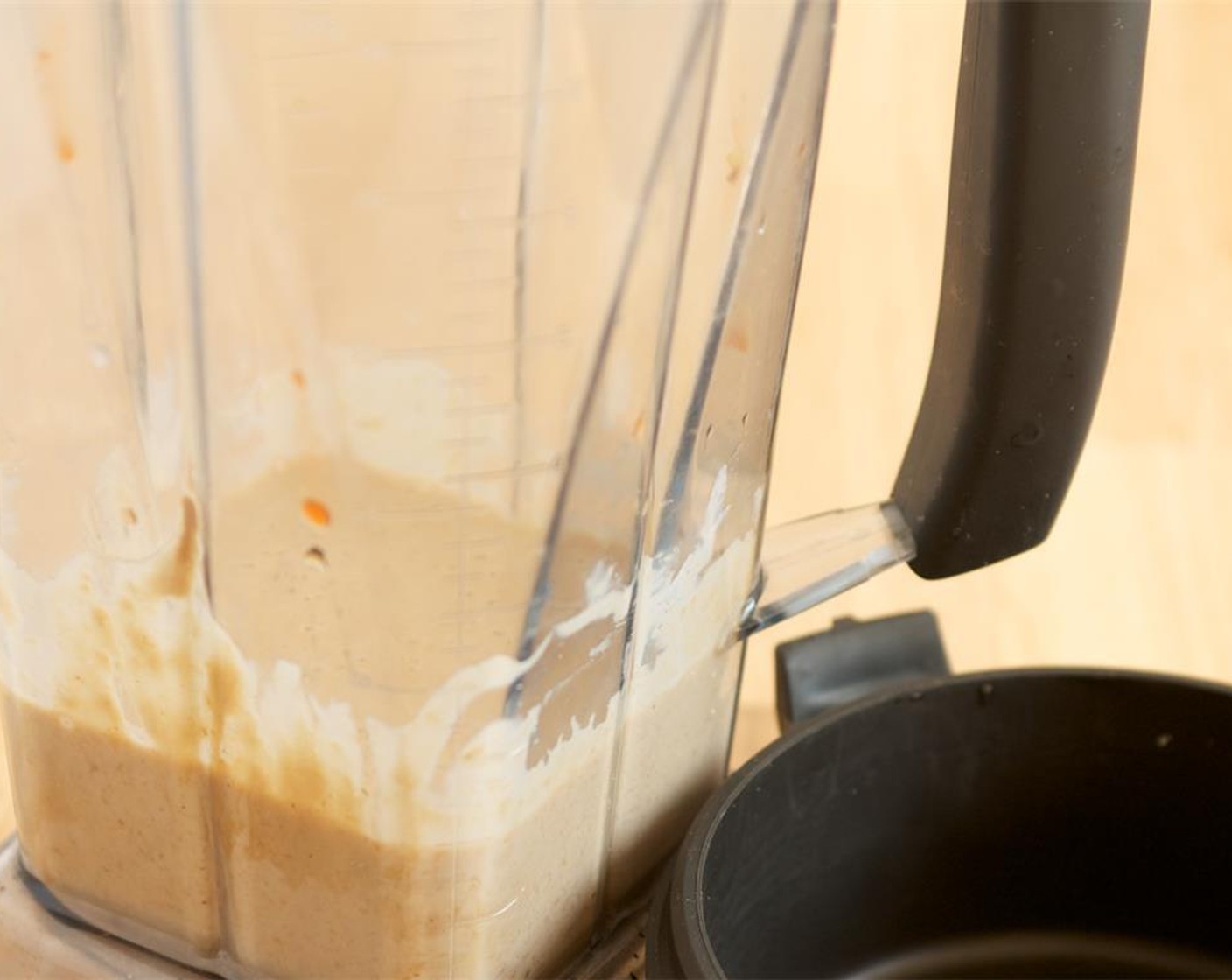 step 6 Place Cashew Butter (1/2 cup), Maple Syrup (2 Tbsp), Chili Paste (1 tsp), Coconut Milk (4 Tbsp), Water (4 Tbsp) and Sea Salt (1 tsp) in a blender. Blend on low until combined. Place the sauce in a serving bowl.