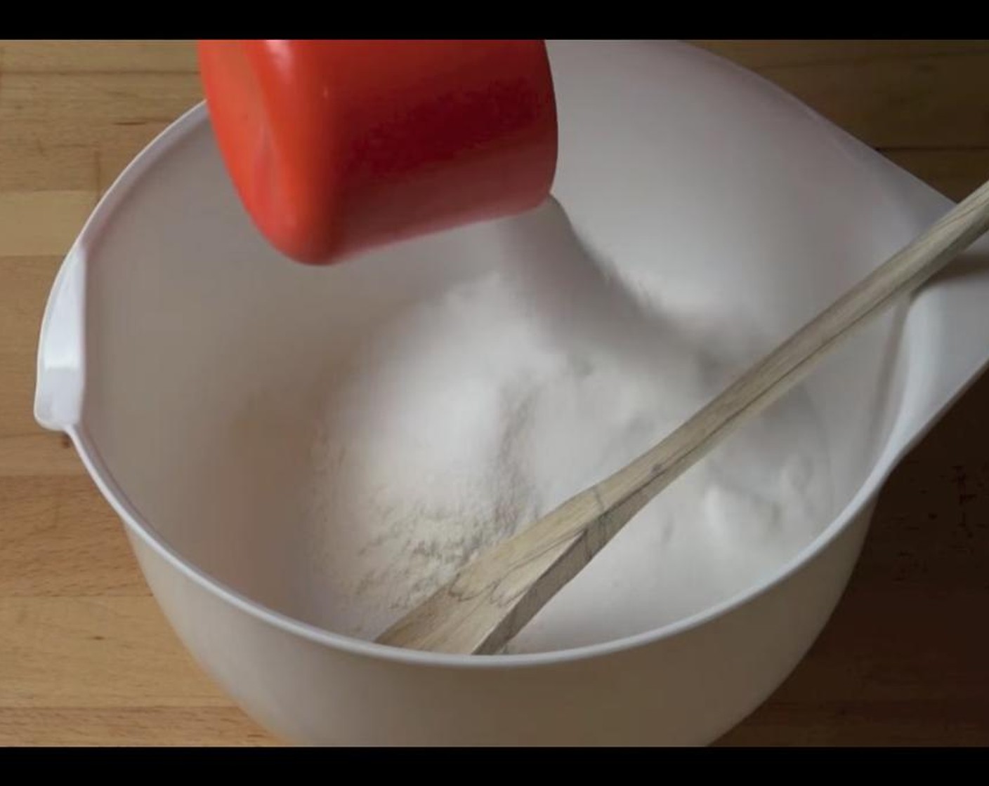 step 2 In a bowl add All-Purpose Flour (1/2 cup), Caster Sugar (1 cup), Desiccated Coconut (1 cup) and mix together.