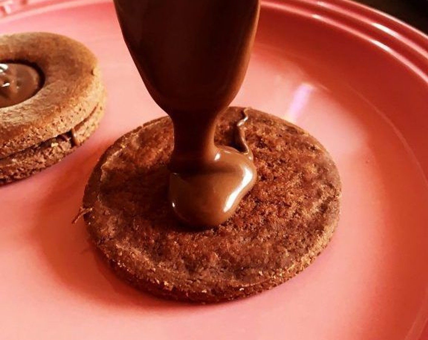 step 7 Let the cookies cool down completely then drop a teaspoon of the Chocolate Hazelnut Spread (to taste) on the whole circles.