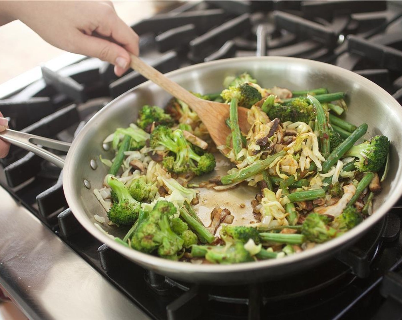 step 8 Add the green beans, Green Cabbage (6 oz), and shiitake mushrooms. Cook for an additional 2 minutes.