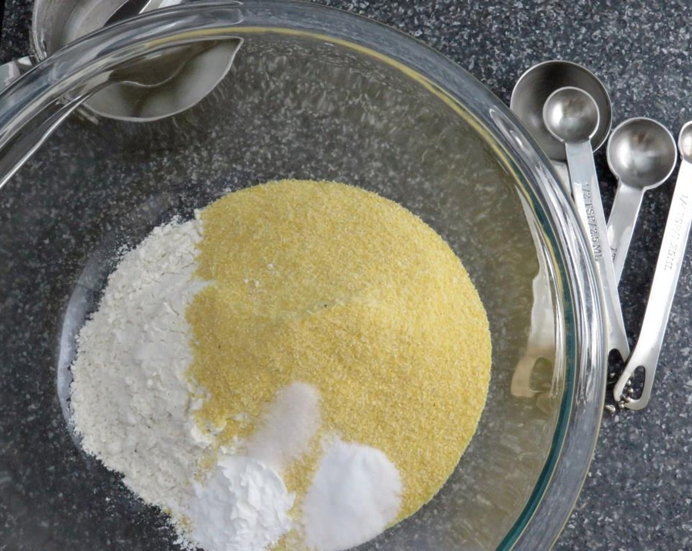 step 2 In a large bowl combine All-Purpose Flour (1 cup), Cornmeal (1 cup), Baking Powder (1/2 Tbsp), Baking Soda (1/2 tsp) and Salt (1/4 tsp).