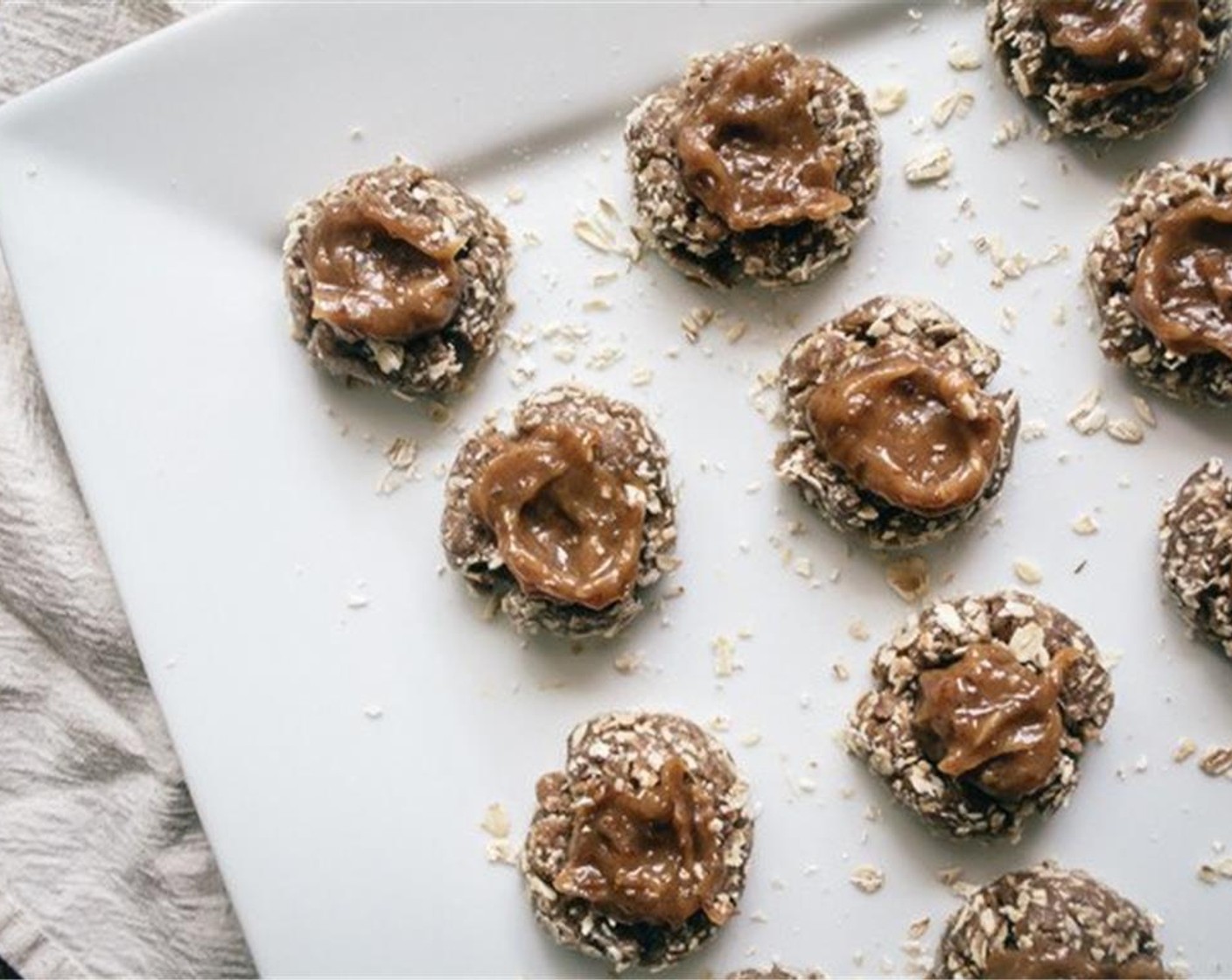 step 6 Add small scoop of caramel to each thumbprint, then serve! Store in refrigerator in air tight container for up to seven days.