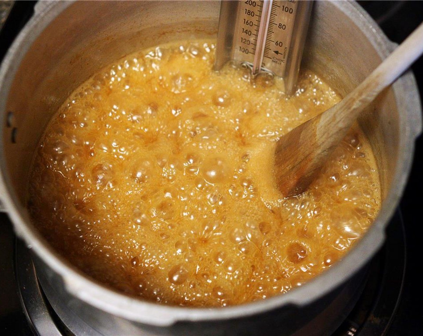 step 5 Once it reaches 300 degrees F (150 degrees C), quickly mix in the Sea Salt Flakes (2 tsp), Simply Organic Cinnamon, Ground (1/2 tsp), and Ground Cloves (1/4 tsp). Cook just a bit longer until the mixture reaches 250 degrees F (120 degrees C). Immediately remove the pot from the heat.