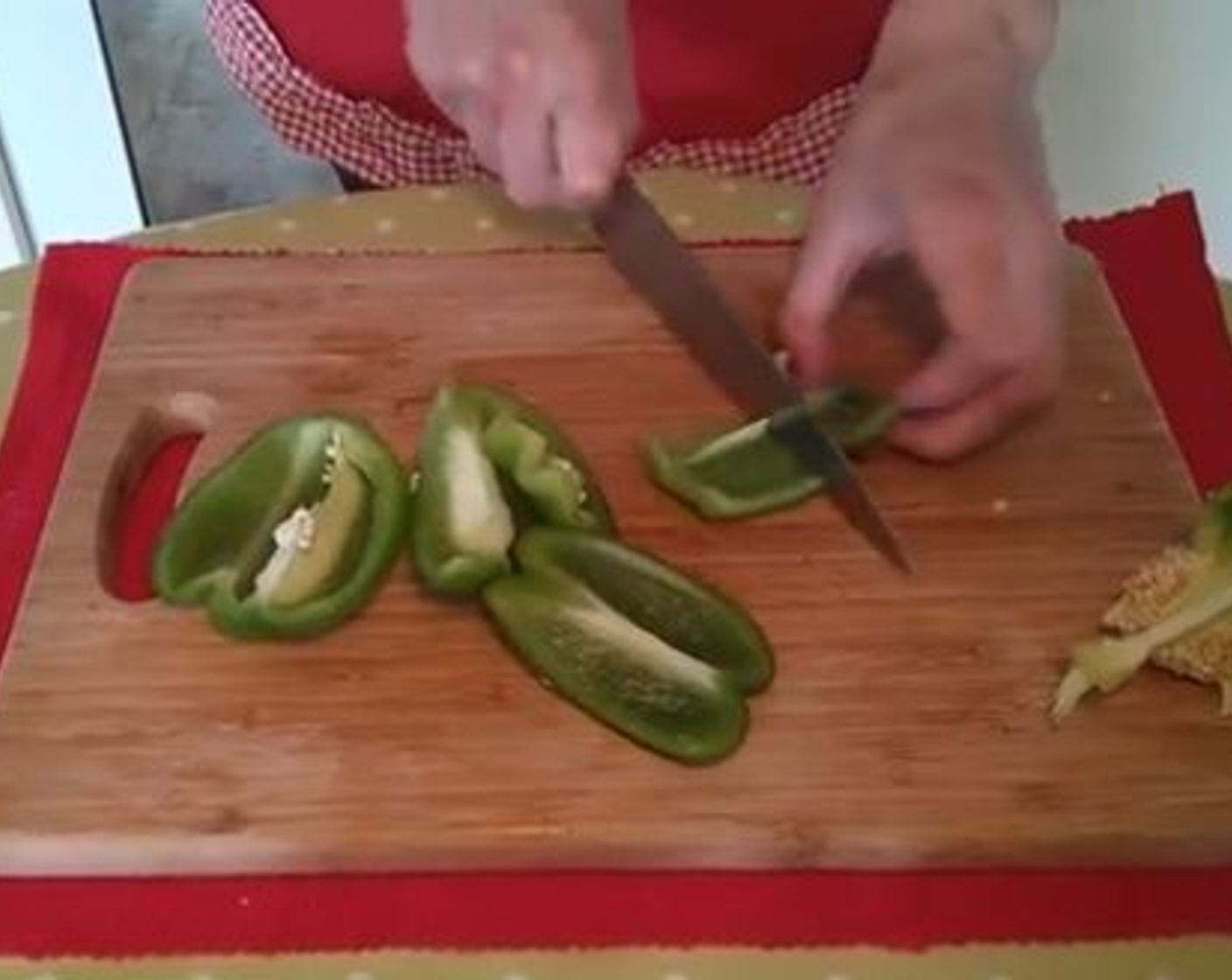 step 2 Deseed and roughly chop the Green Bell Pepper (1) and Yellow Bell Pepper (1).