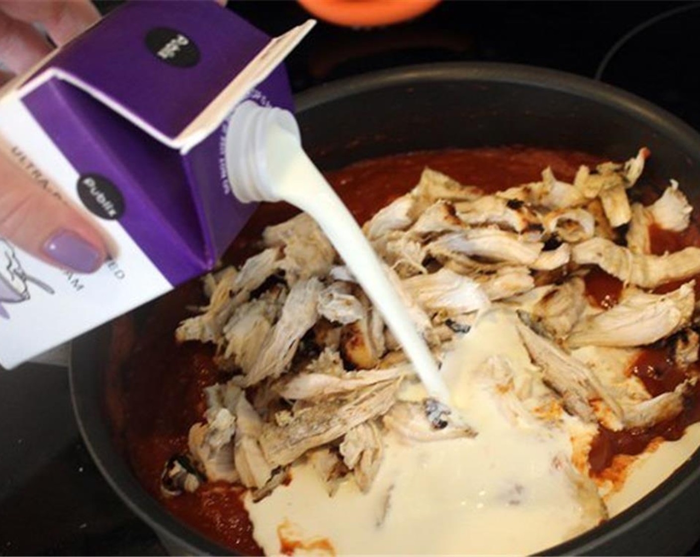step 19 Add the shredded chicken and the Heavy Cream (1/2 cup).