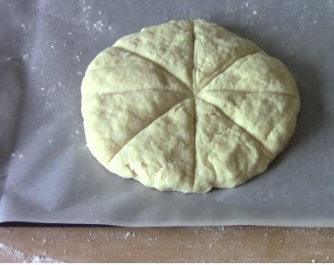 step 2 Add the Water (3/4 cup) and mix until the dough comes together. Kneed the dough on a floured surface, and shape it into a disc shape. Make wedge marks on the top, and bake the dough inside an oven for about 30 minutes at 350 degrees F (180 degrees C).