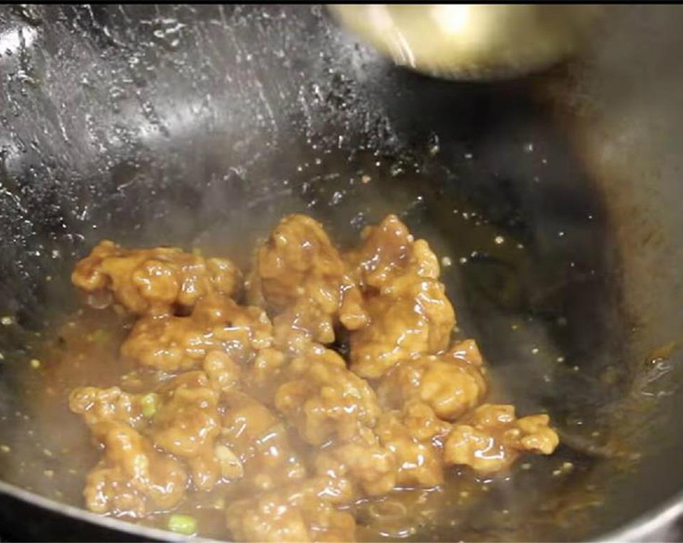 step 11 Add the chicken and mix. Lastly, add Sesame Oil (1 tsp) and toss.