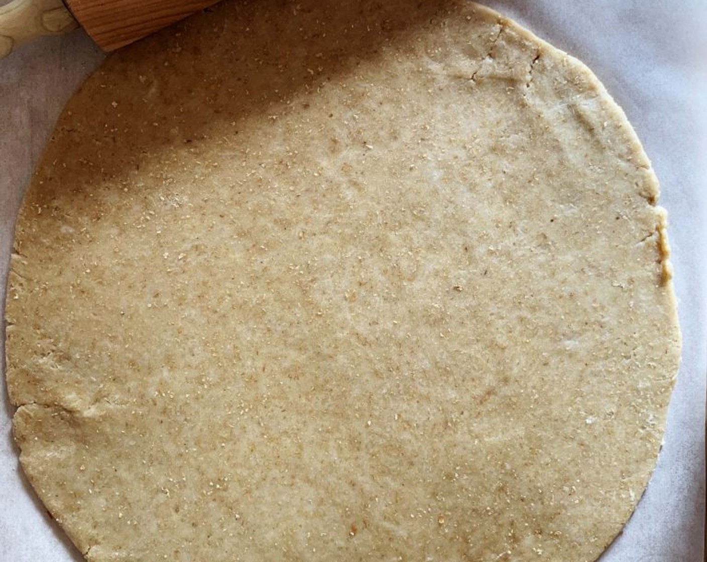 step 5 Roll out the dough into a circle, not too thin as this won’t grow when cooking.