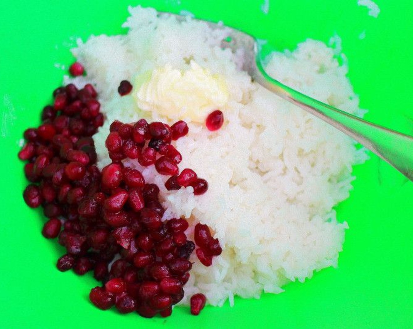 step 6 Mix together cooked White Rice (2 1/2 Tbsp), Pomegranate Seeds (1/2 cup), and Butter (1/4 cup).