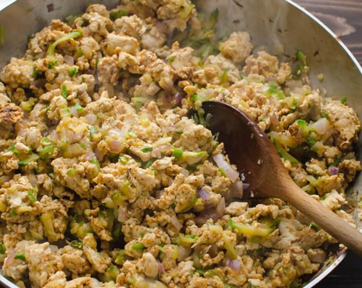 step 5 Add remaining Olive Oil (1 Tbsp) to the pan and add the Ground Turkey (1 lb), breaking it up and stirring until browned.