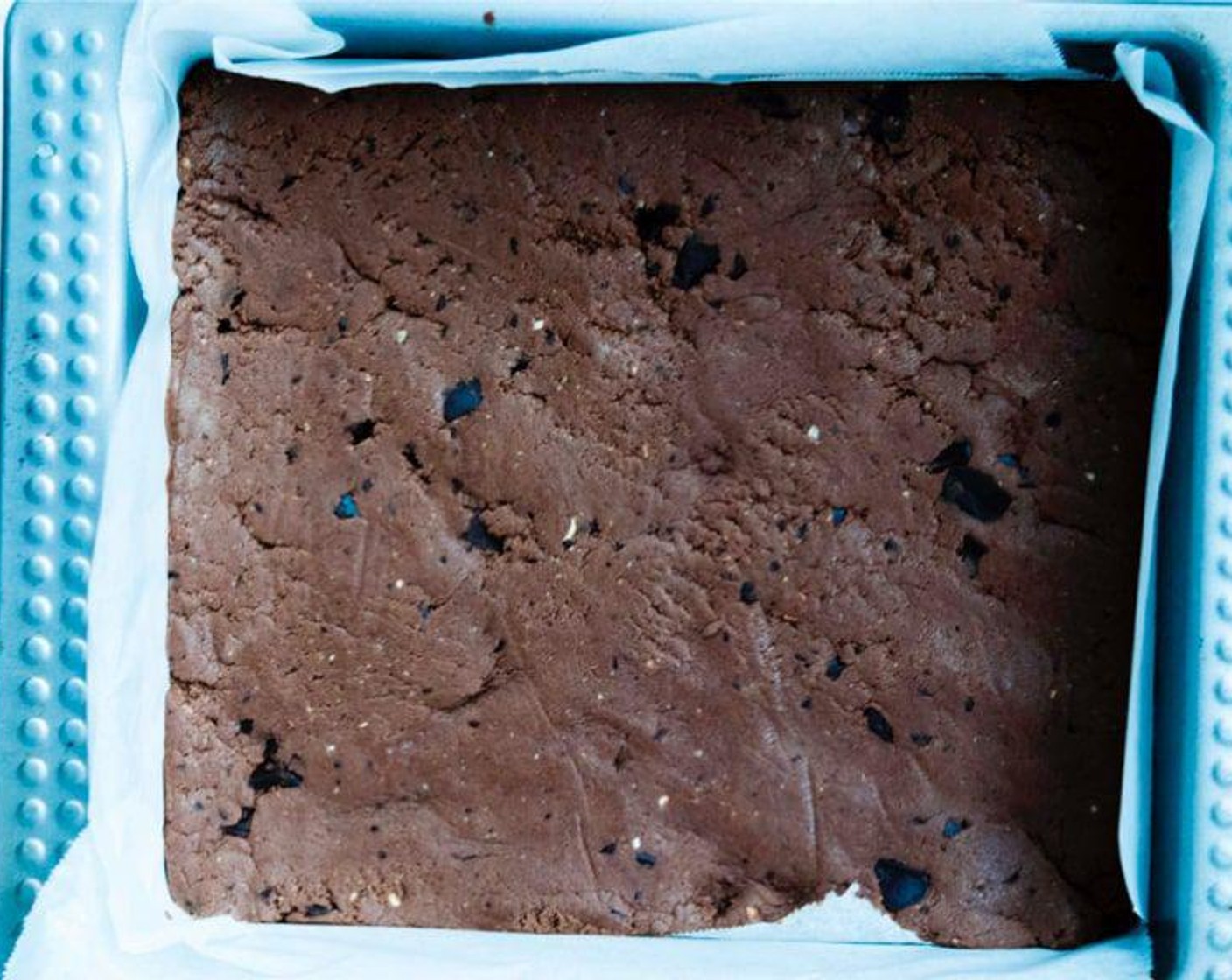 step 3 Spread it into a baking tray layered with parchment paper and refrigerate overnight or for 8 hours.