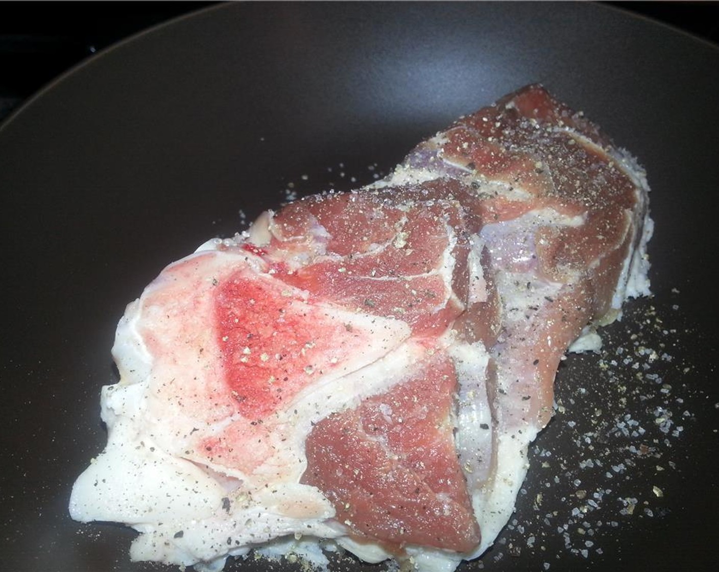step 3 Heat the Olive Oil (1 Tbsp) in your pressure cooker over medium-high heat. Season the pork heavily on all sides with Salt (to taste) and Ground Black Pepper (to taste). When the oil begins to smoke, sear on all sides until a nice golden brown.