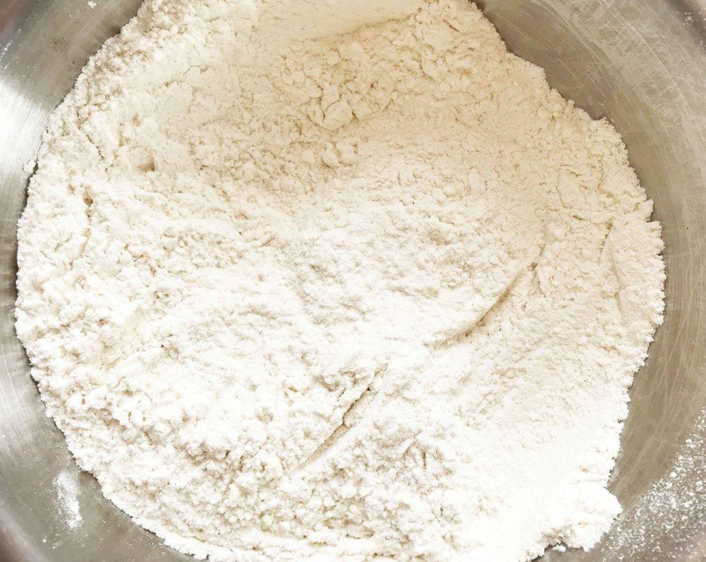 step 1 In a medium bowl, whisk together the All-Purpose Flour (2/3 cup) Whole Wheat Flour (1 Tbsp) Baking Powder (1 tsp) and Fine Sea Salt (1 pinch). Set aside.
