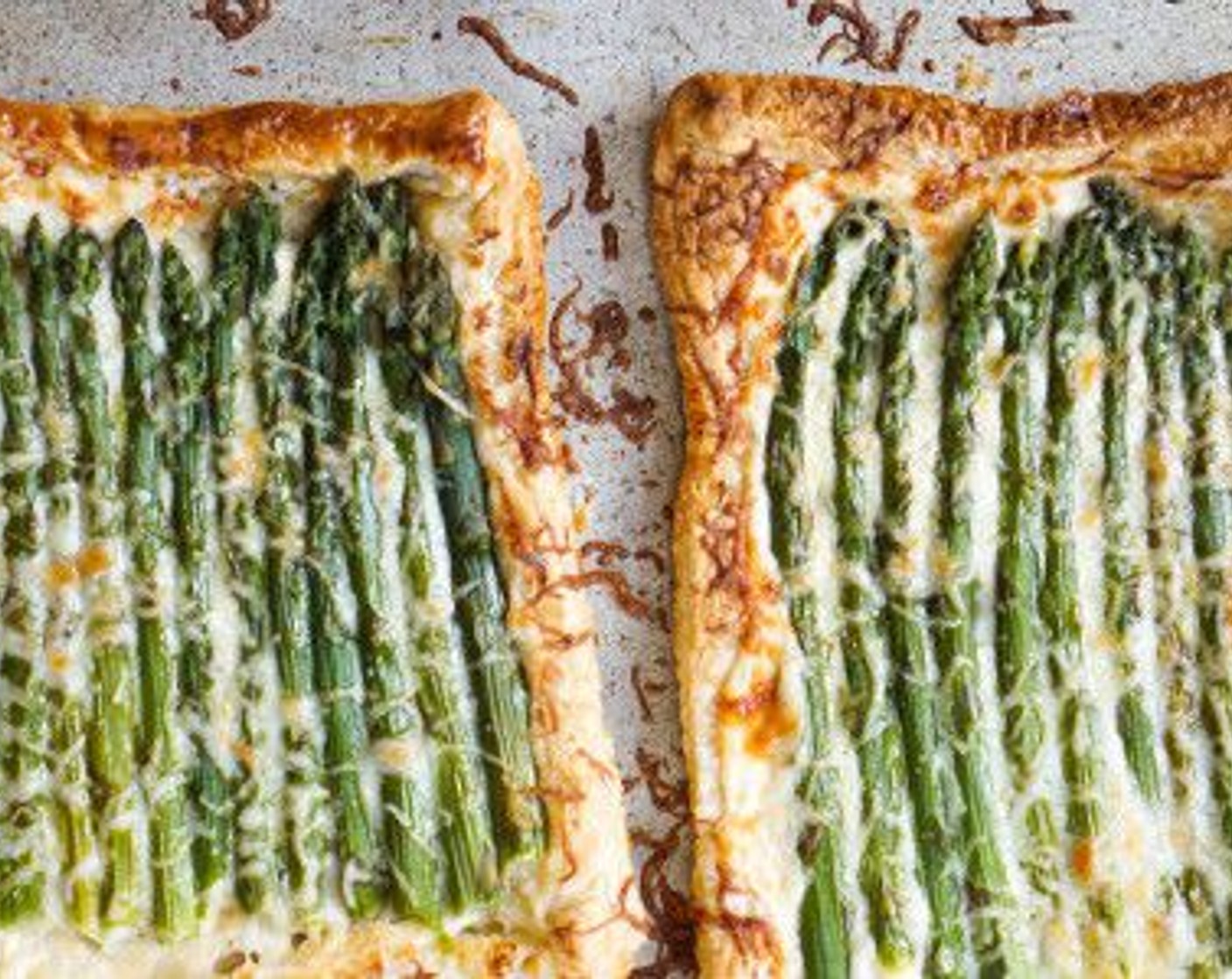 step 12 Bake for 12 minutes until asparagus is roasted, cheese is melted, and the pastry is golden brown.