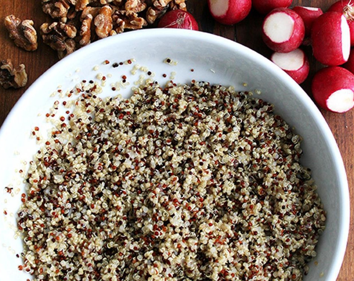 step 1 Bring a pot of water to boil. Meanwhile, place the Quinoa (1 cup) in a sieve and rinse under cold water. When water boils, add the quinoa and simmer for 9 minutes. Drain in sieve and run under cold water until cool. Set aside to dry.