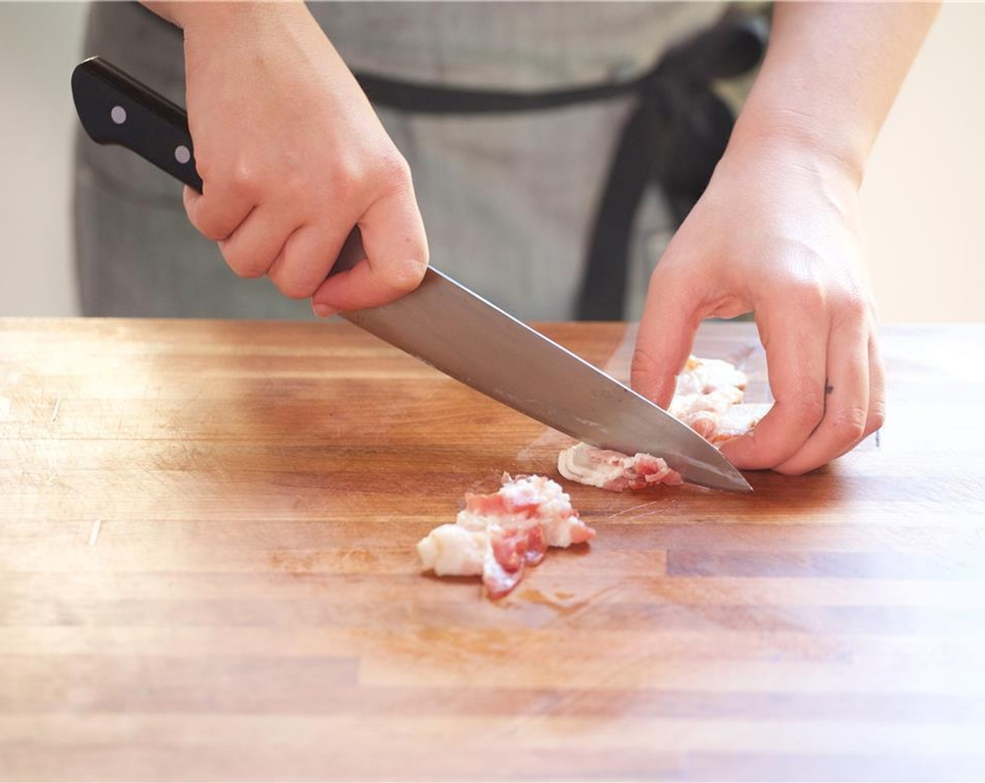 step 2 Juice Lemon (1) into a small bowl, and set aside. Slice one tablespoon of Fresh Chives (3 Tbsp) into quarter inch pieces and set aside. Dice Bacon (4 slices) into half inch diced pieces, and set aside.