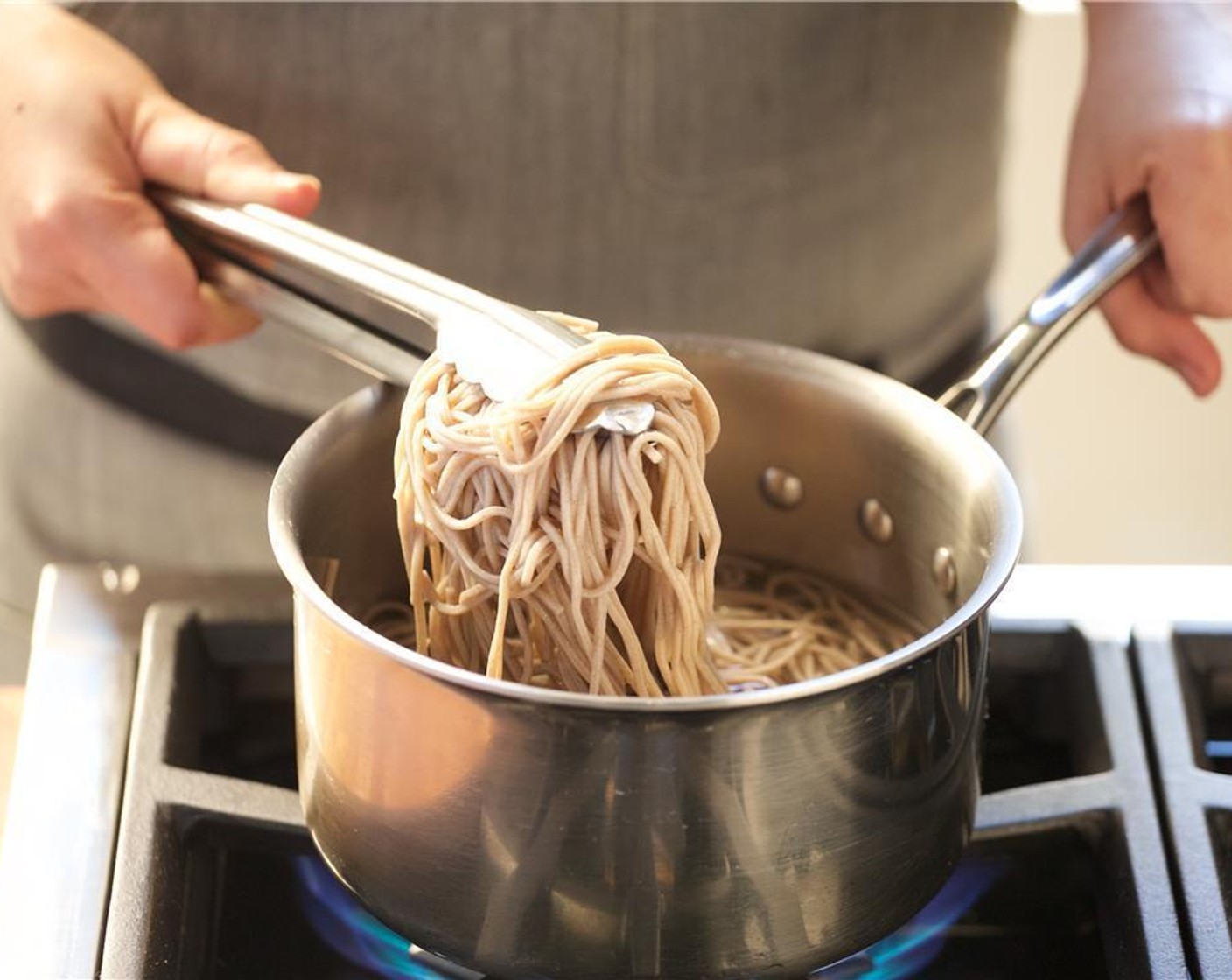 step 3 Bring eight cups of water to a boil in a medium saucepan. Add the Soba Noodles (6 oz) to the boiling water, and cook for four minutes.