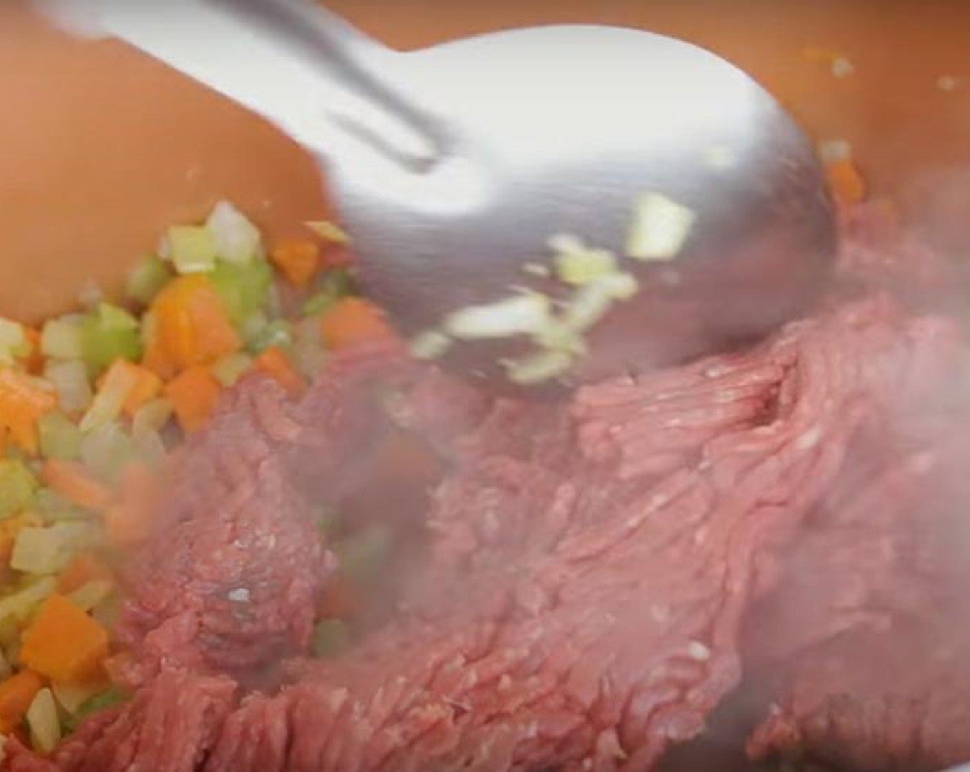 step 2 Add Ground Beef (1 lb), breaking it up with a spoon, add Salt (to taste) and Ground Black Pepper (to taste). Cook until the meat has begun to brown, 5-7 minutes.