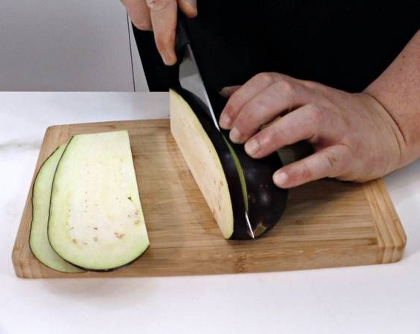 step 1 Start by cutting the Eggplant (1) vertically in 1-centimeter slices.