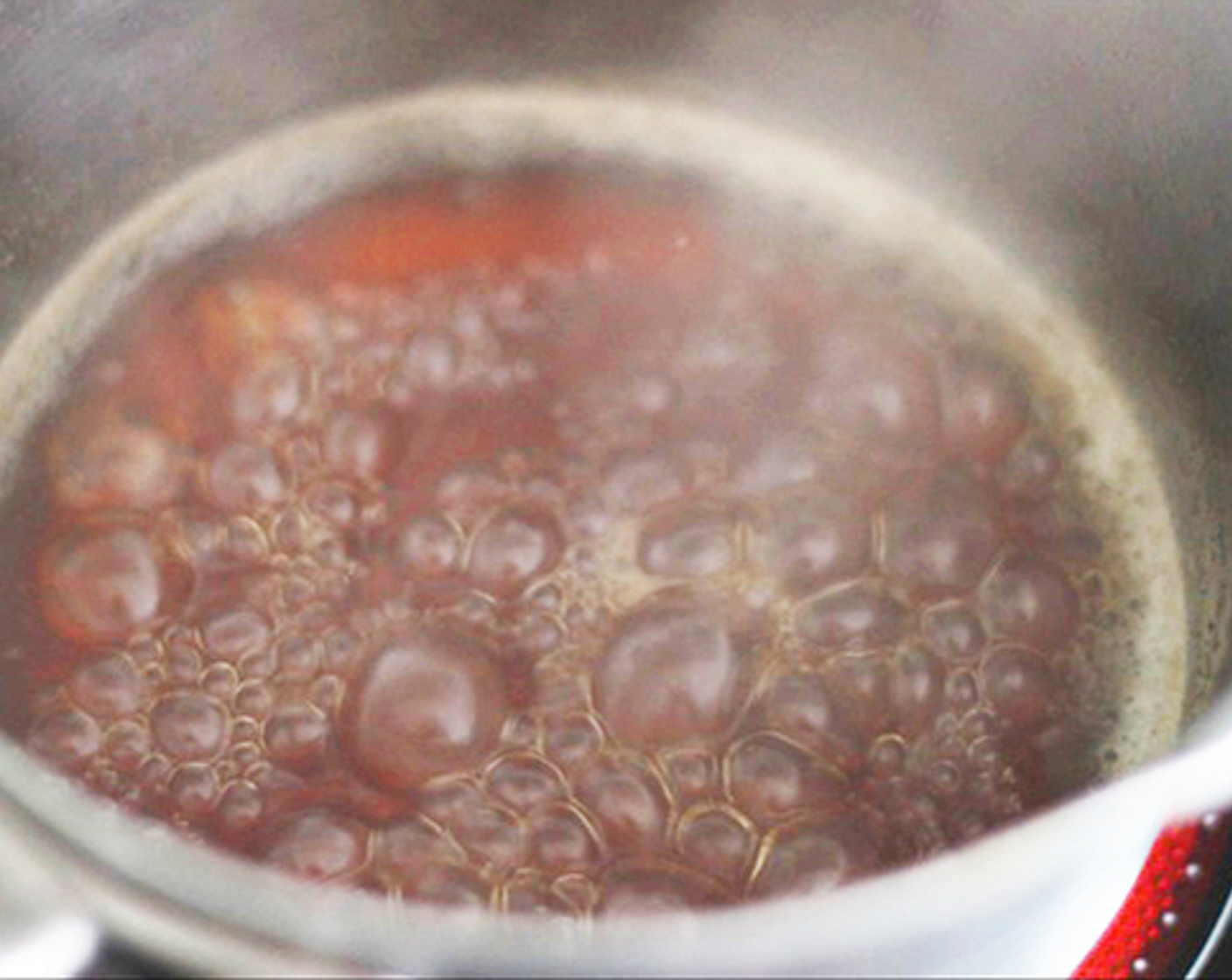 step 1 To make the Kuromitsu, Put the Kurozato Dark Brown Sugar (1/3 cup), Honey (1 Tbsp), and Water (2 cups) in the pot and heat it on the medium heat.