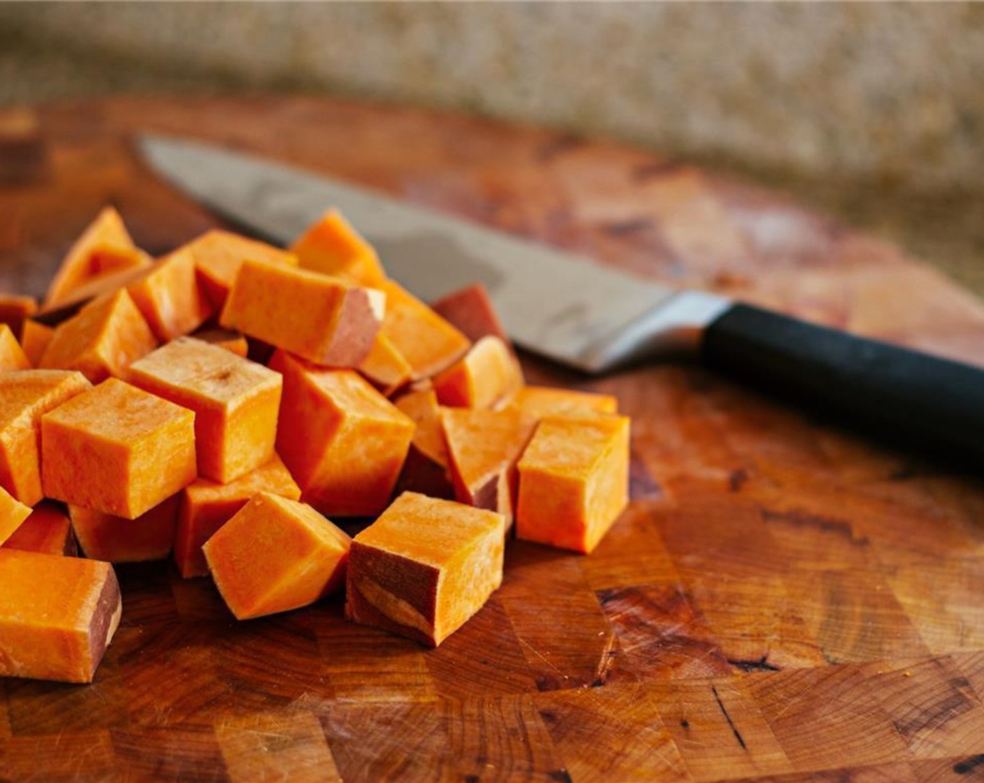 step 2 Scrub then dice the Sweet Potatoes (2)  into 1 inch pieces.