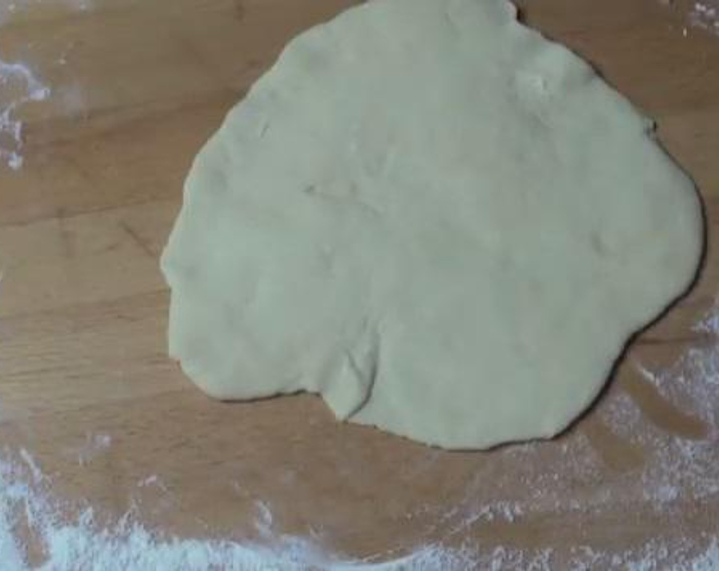 step 5 Shape the dough into a sausage shape, and cut into 6 even pieces. Roll each piece into a circular shape.