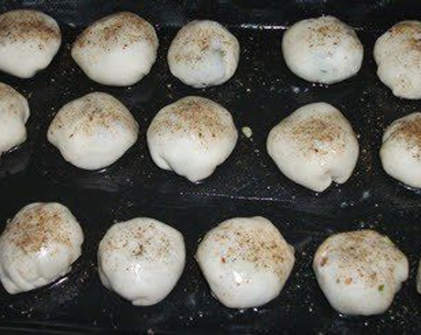 step 13 Brush the top of these rolls with Olive Oil (2 Tbsp). Sprinkle some Dried Mixed Herbs (2 tsp) over the top.