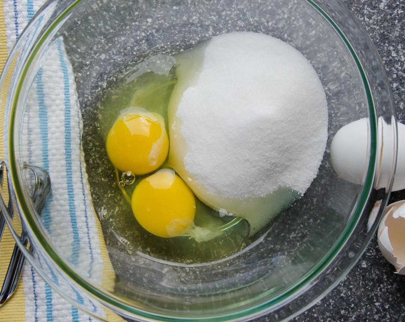 step 1 In a medium mixing bowl, using a hand mixer, beat together the Granulated Sugar (2/3 cup) and Eggs (2) until thickened and pale yellow, about 3 minutes.