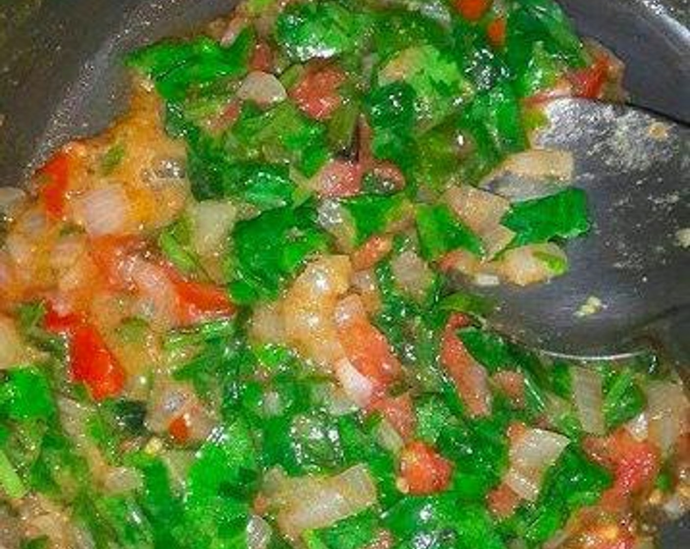 step 4 Add the Tomato (1), Salt (to taste), Ground Turmeric (1/4 tsp), Red Chili Powder (1/2 tsp), Asafoetida (1/4 tsp), and Ground Coriander (1/2 tsp). Saute for another 2 minutes, until the tomatoes become soft and mushy.
