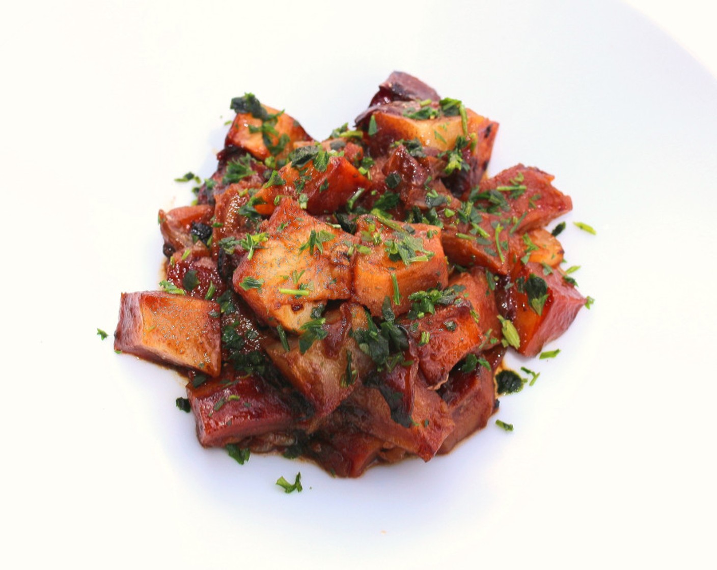 step 7 Divide the potatoes onto 2 serving plates and sprinkle with Fresh Parsley (1 pinch).