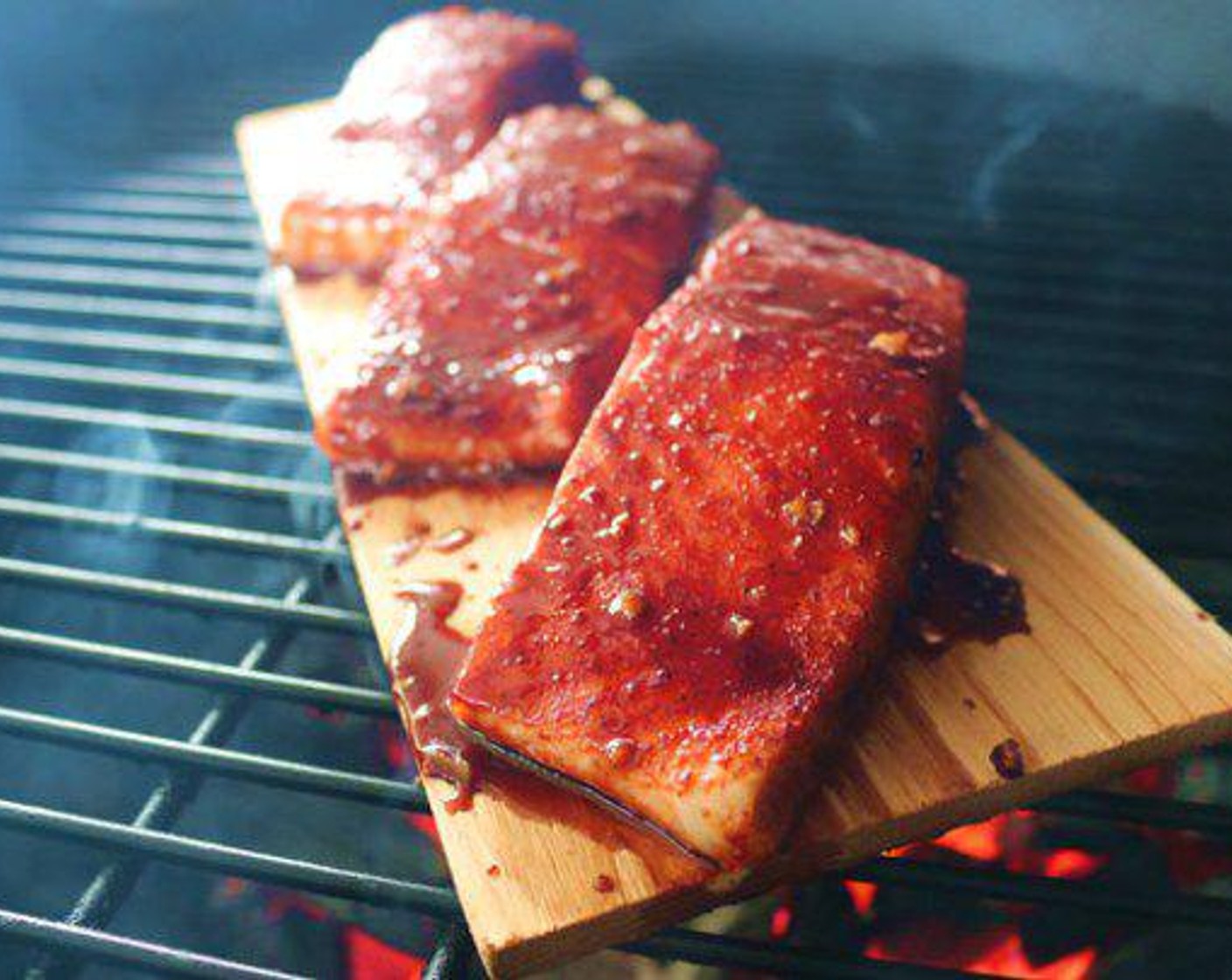 step 3 Arrange Salmon on grilling plank and place on the center of the cooking grate. Cook salmon for approximately 20 minutes.