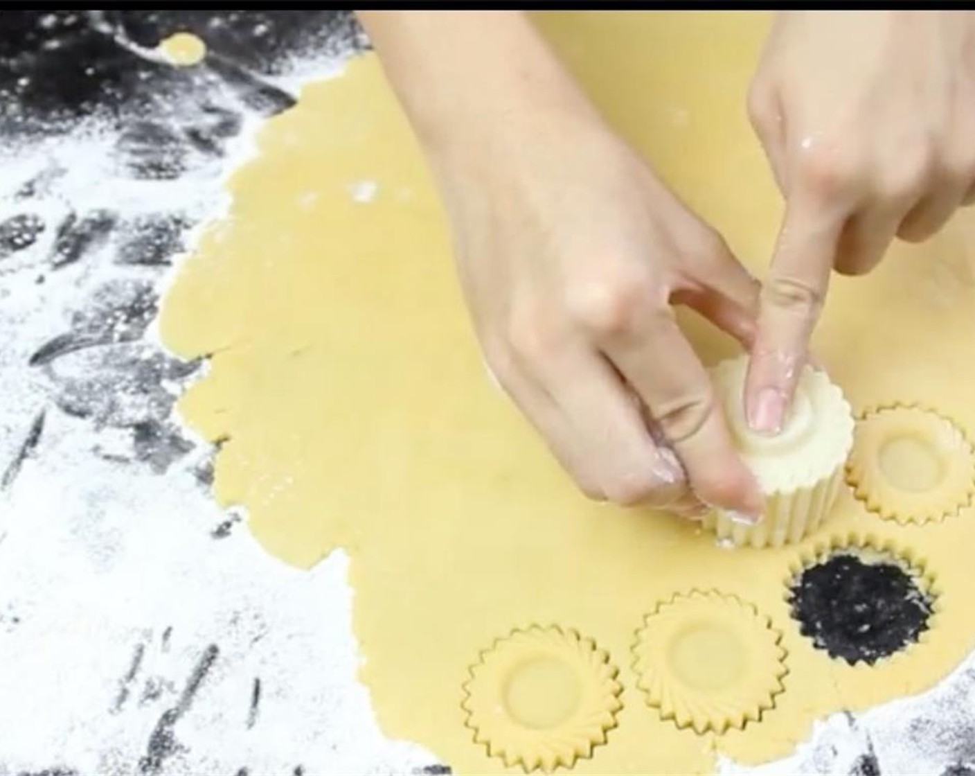 step 10 Using a cookie cutter, cut out shapes and transfer them to a baking tray lined with parchment paper.