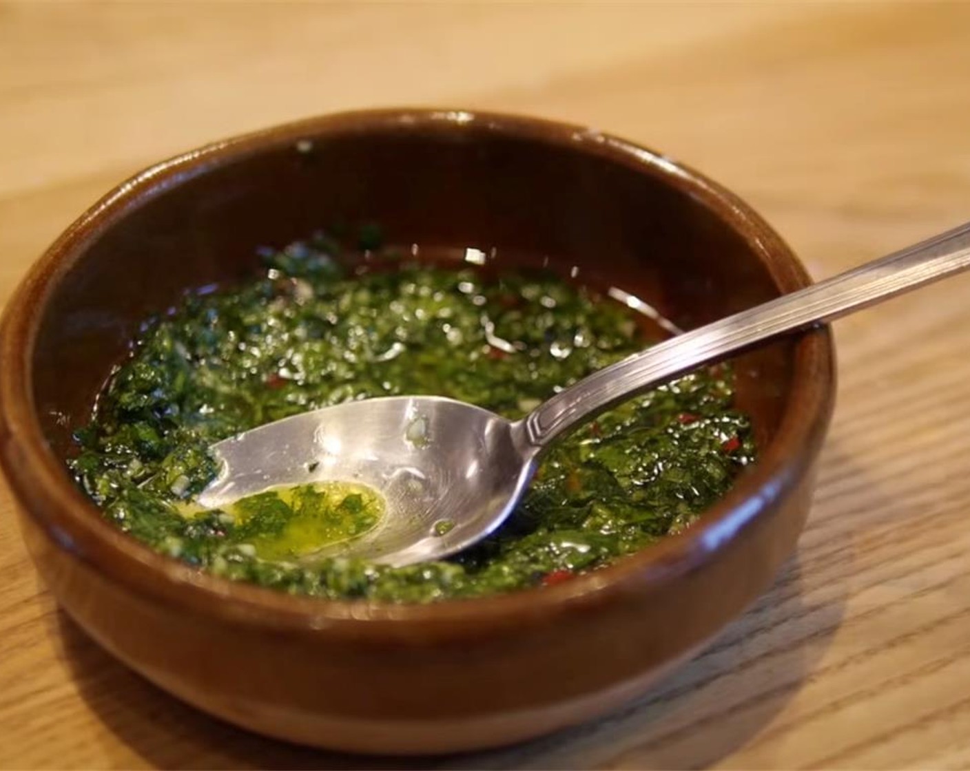 step 4 To make herb sauce, add Garlic (1 clove), Chili Pepper (1), Fresh Cilantro (1/2 bunch), and Salt (to taste) to a food processor, and process well. Transfer to a small bowl and add White Wine Vinegar (3 Tbsp) and Olive Oil (3 Tbsp). Mix well.