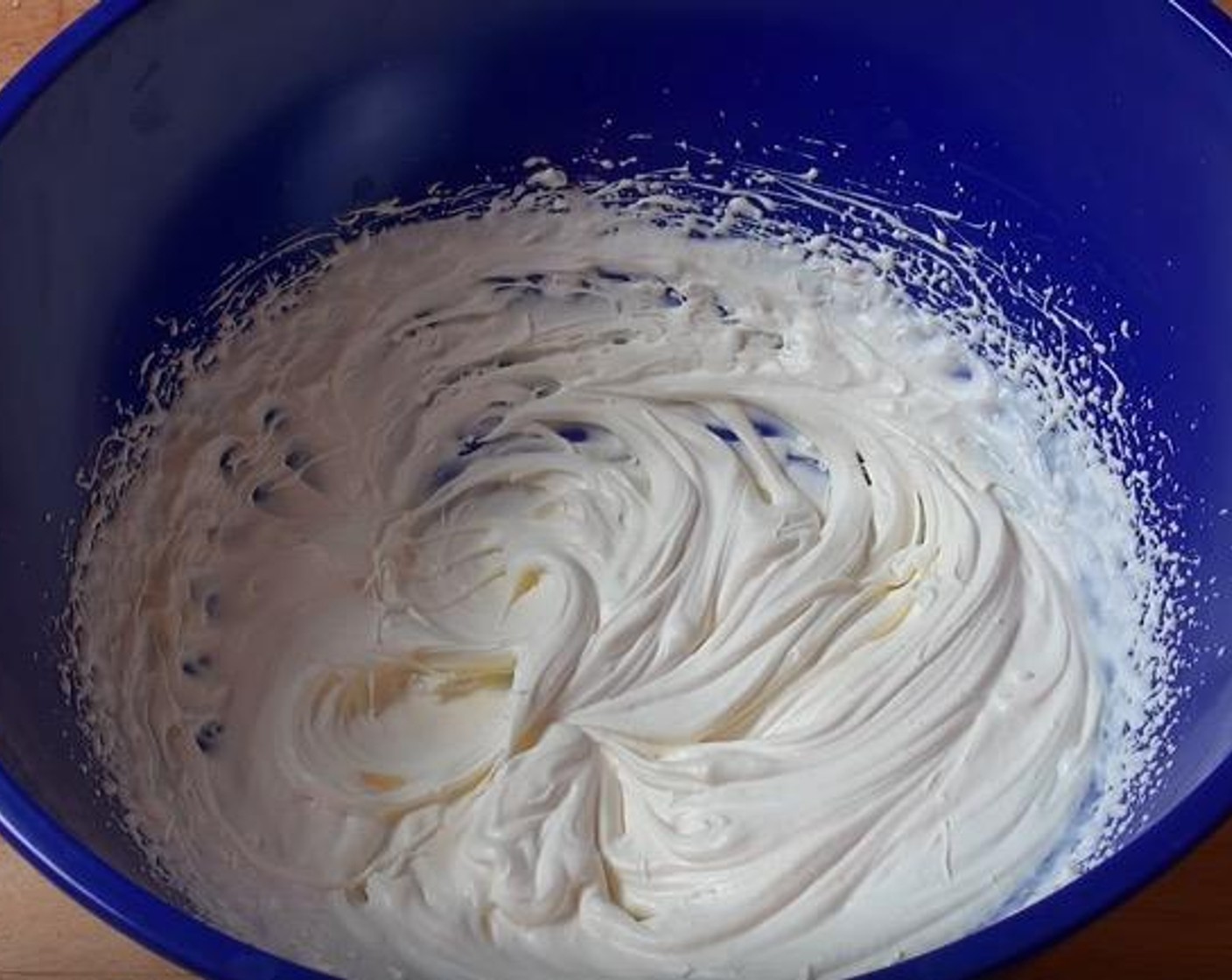 step 5 In a large mixing bowl, beat Whipping Cream (3/4 cup) until it forms soft peaks.